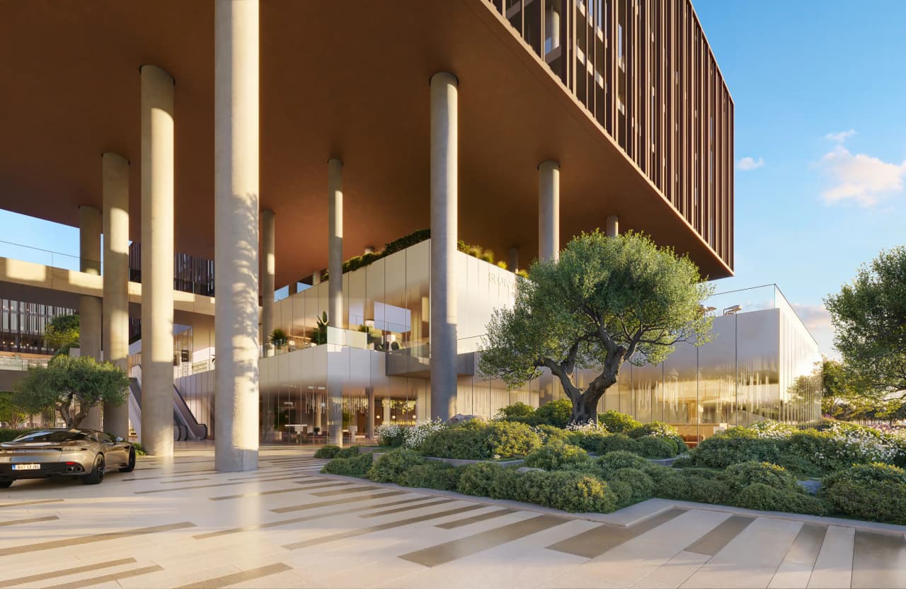Landscaped arrival with planting beneath the copper office blocks of The Yards Plaza