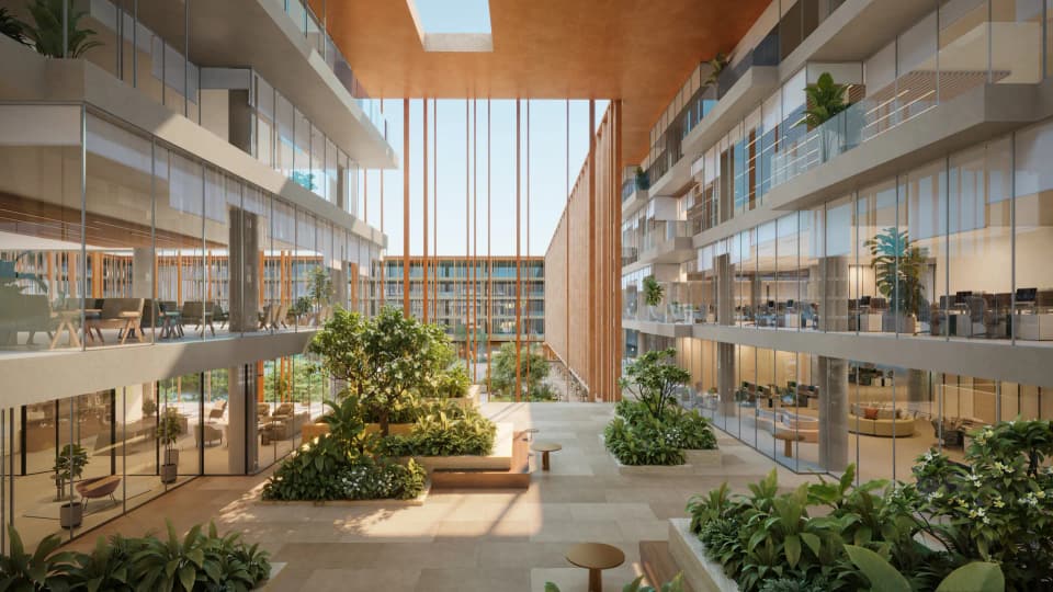 Planted atrium connecting the office floors at The Yards Plaza